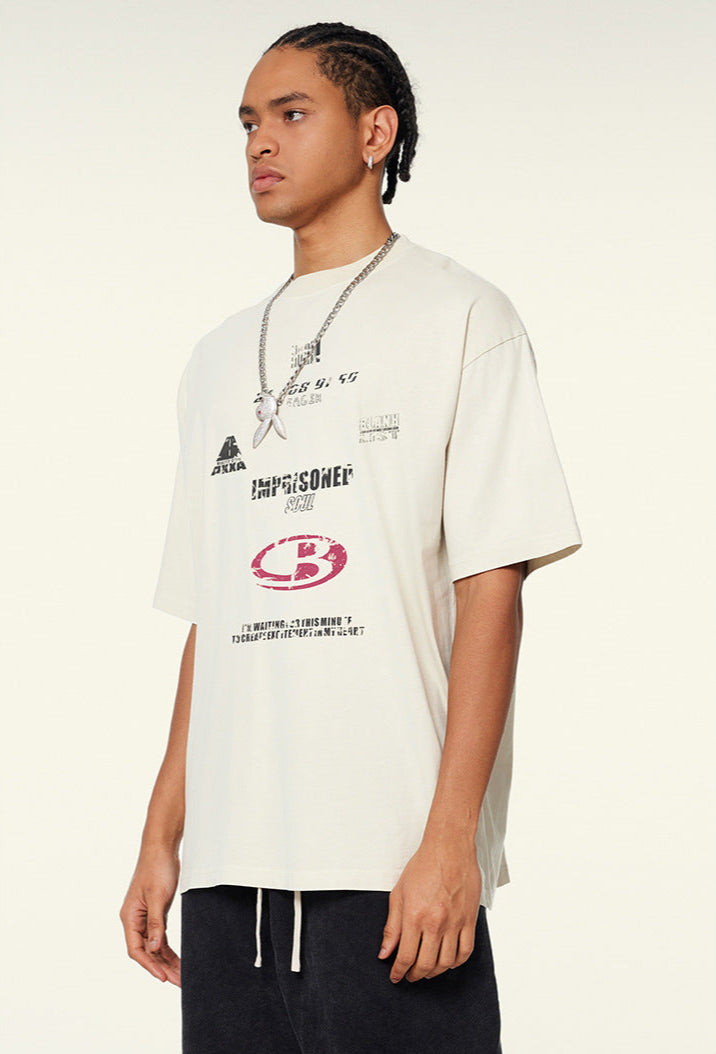 Side angle of model in cream tee with relaxed fit
