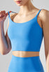 Blue cropped workout cami with scoop neckline and breathable Coolmax fabric