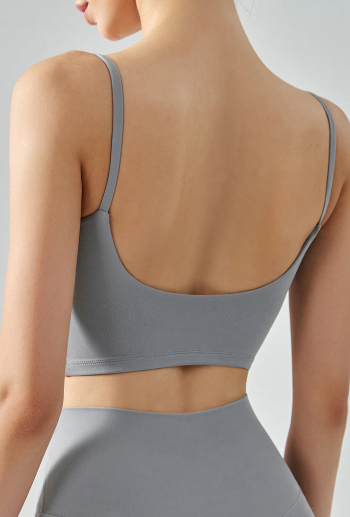 French gray seamless cropped tank top with cami straps and sculpting fit, back view.
