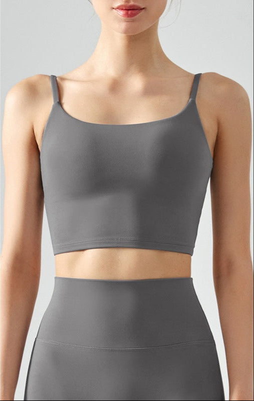 Gray seamless tank top cropped with cami straps and sculpting fit
