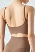 Cropped yoga tank top in sandal with square neck, open back, and removable chest pads
