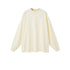 Cream oversized sweatshirt with crew neck and dropped shoulders on plain background