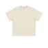 Cream colored basic t-shirt with crew neck and short sleeves, displayed flat against white background