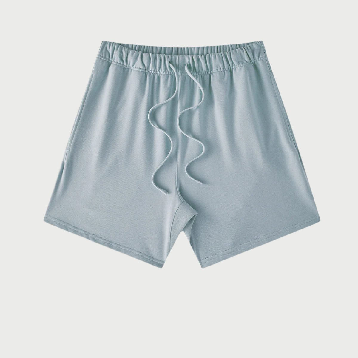 Pale blue drawstring shorts displayed flat against light gray background with elastic waistband