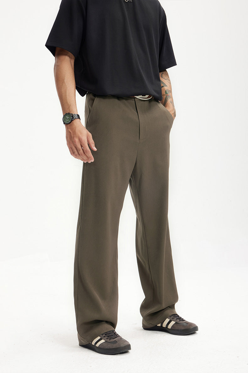 Side view of dark brown mens dress pants showing relaxed straight fit