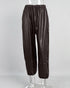 Dark brown PU pants front view