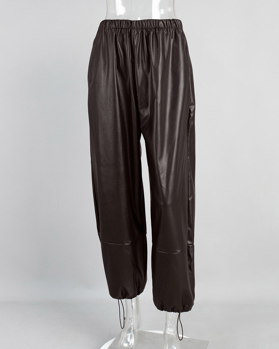 Dark brown PU pants front view