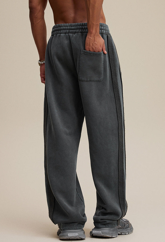 Dark gray baggy sweatpants, back view showing pocket