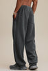 Dark gray baggy sweatpants, back view with single pocket