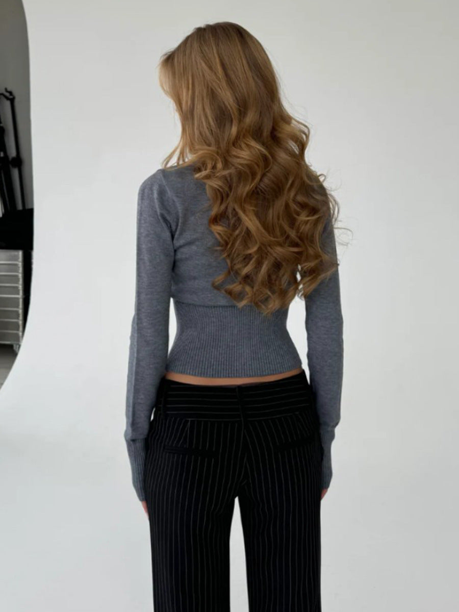 Back view of dark gray viscose knit cardigan sweater