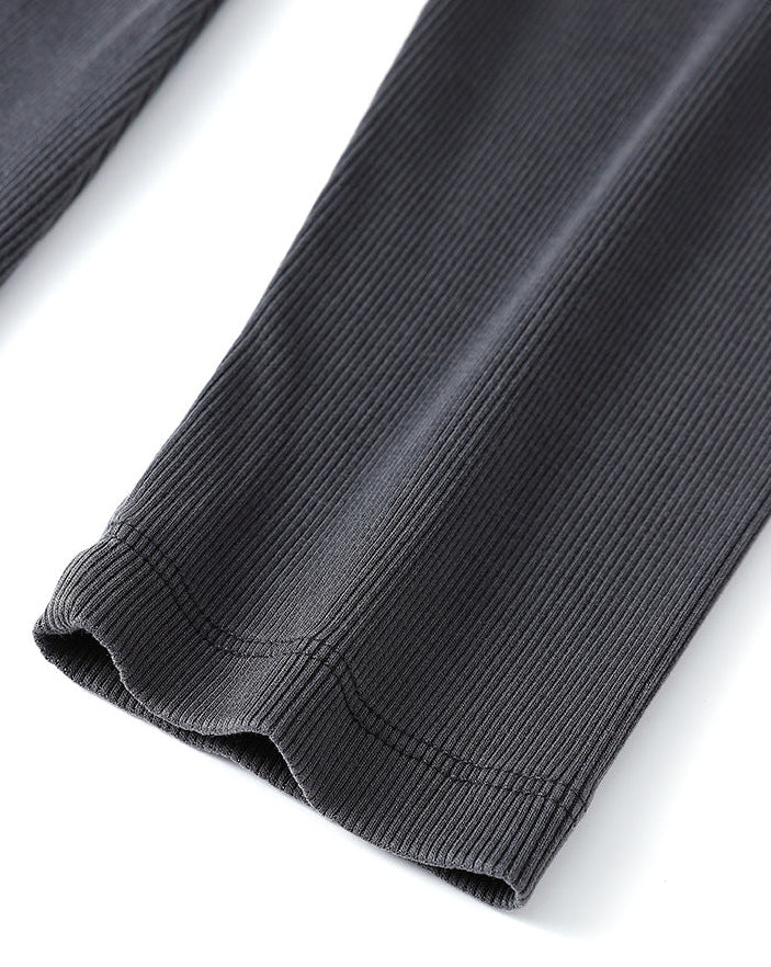 Rib texture detail on dark gray long sleeve bodycon dress fabric