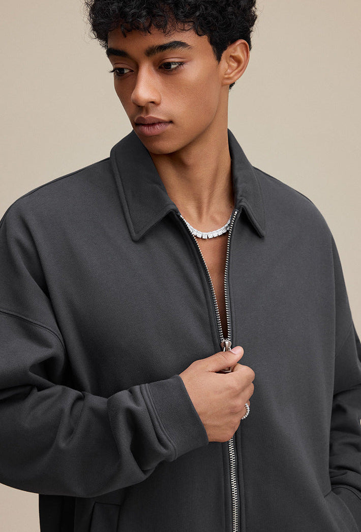 Dark gray polo zip up, collar and zipper close-up