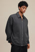 Dark gray polo zip up, three-quarter pose