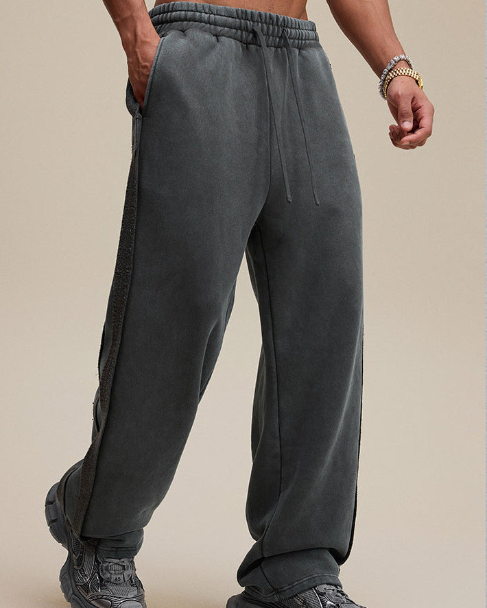 Dark gray wide leg sweatpants, stacked hem, side panel detail