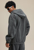 Dark gray zip hoodie back view with oversized hood and rib hem