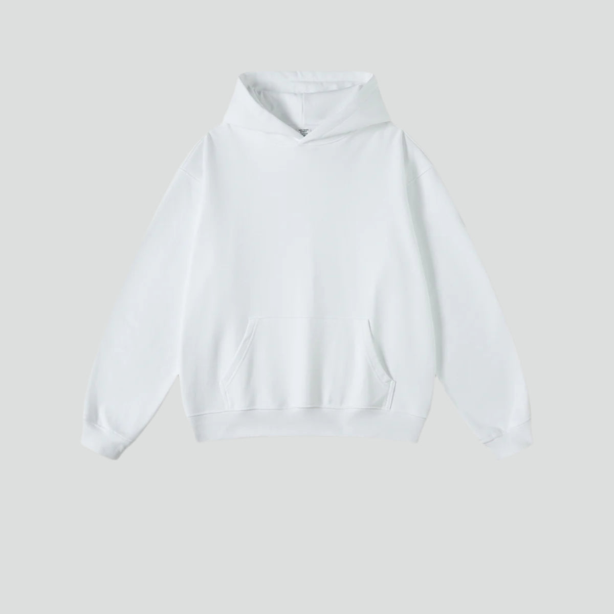 White cotton hoodie with front pocket and ribbed cuffs on light background