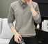 Light gray sweater with striped collar and sleeves