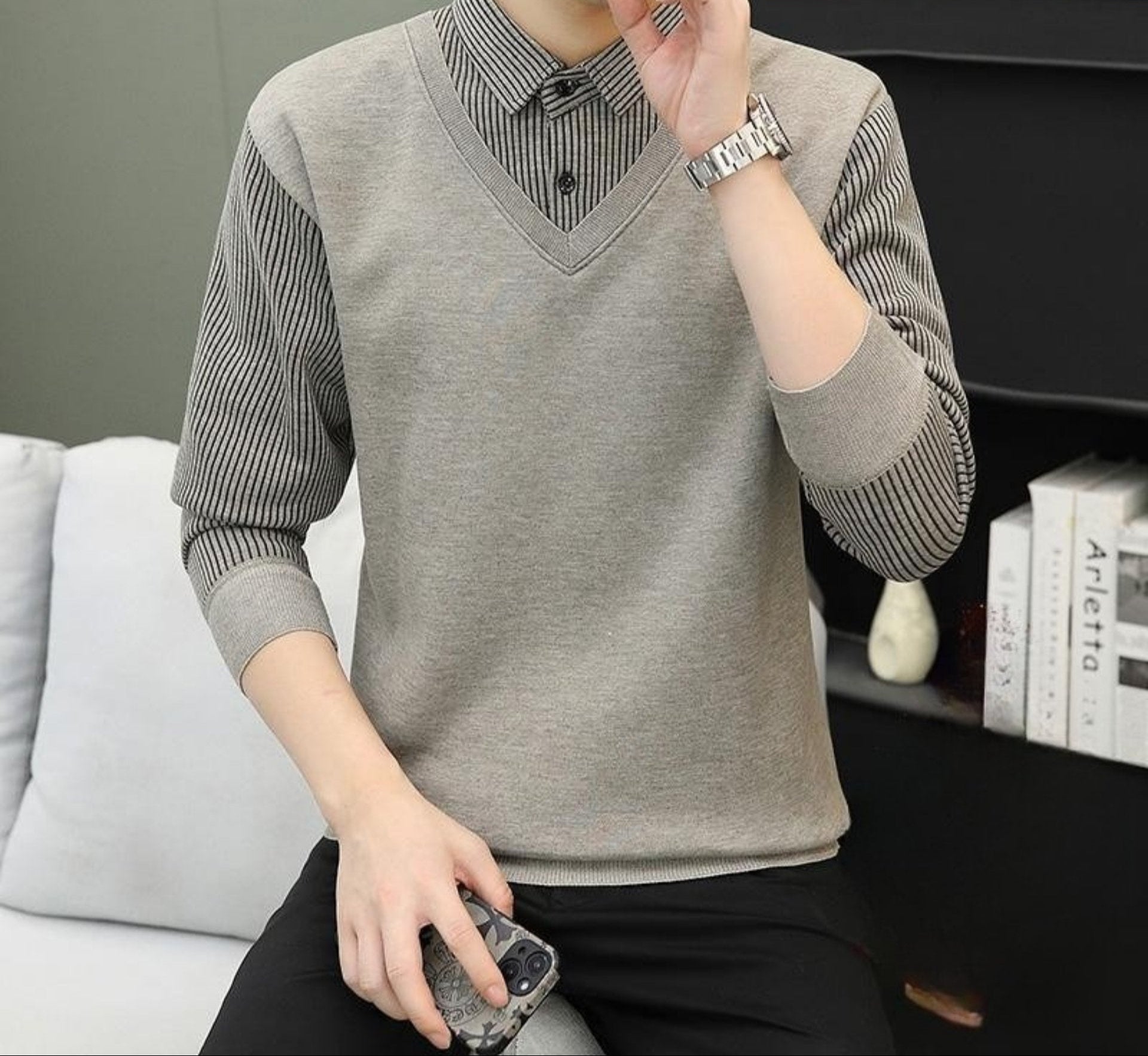 Light gray sweater with striped collar and sleeves