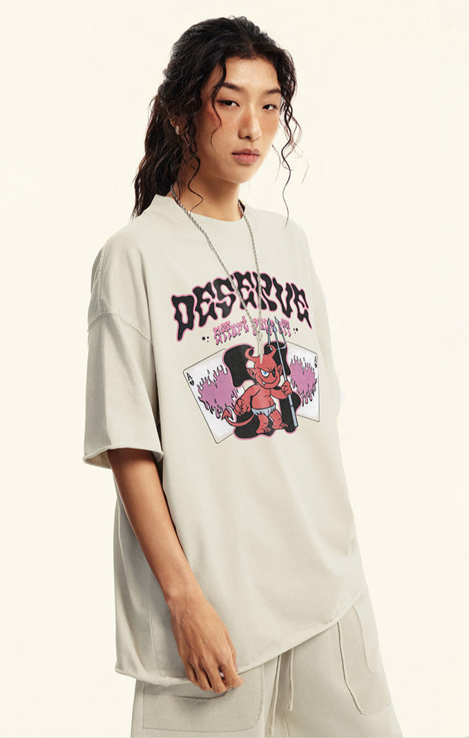 Angled side view of model in off-white "Deserve" devil tee.