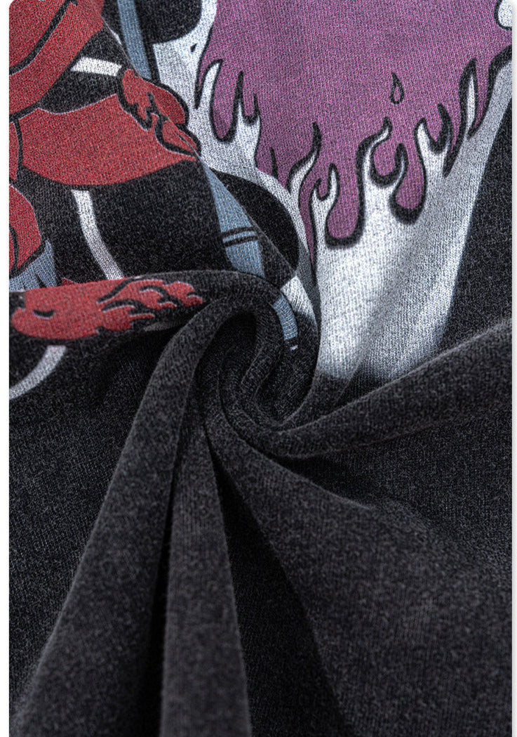 Detailed view of devil graphic and soft cotton fabric texture.