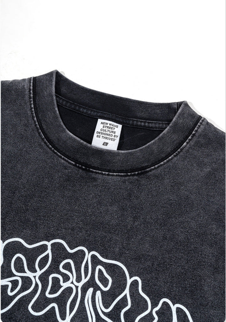 Close-up of collar and tag reading 'New Wave Street Culture Designed by Be Thrived'.