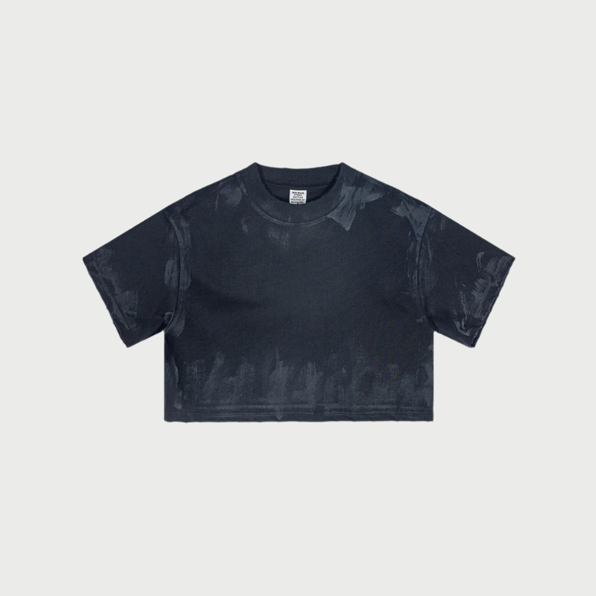 Dark gray cropped t-shirt with cityscape design at bottom hem displayed flat against white background