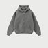 Dark gray oversized zip-up hoodie with front kangaroo pocket and ribbed cuffs displayed on light gray background