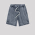 A pair of blue washed drawstring shorts with an elastic waistband, side pockets, and a casual, relaxed fit