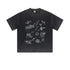 Flat lay of black graffiti-print oversized t-shirt with crew neck and dropped shoulders
