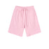 Soft pink cotton shorts with elastic waistband and matching drawstring ties, displayed against white background