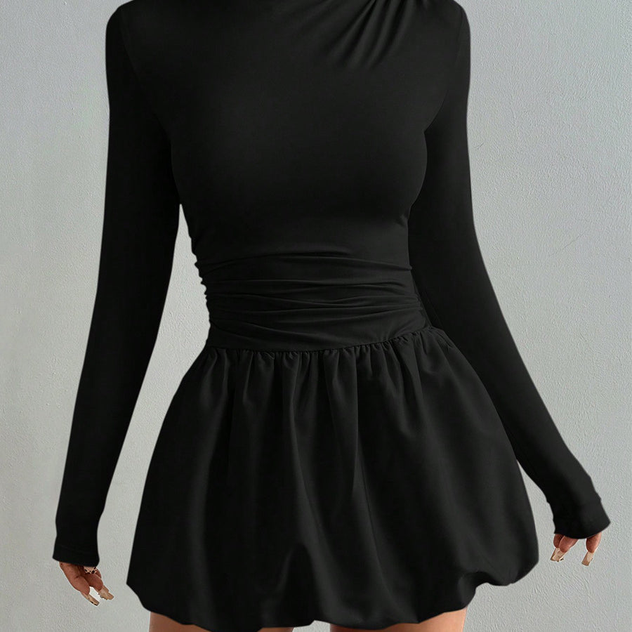 Elegant black mini dress with bubble skirt fitted long sleeve top