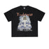 Flat-lay of black graphic T-shirt with red 'Embrace' text and angel illustration above 'Towards Happiness' text.