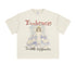 Flat-lay of cream-colored graphic T-shirt with red 'Embrace' text and angel illustration above 'Towards Happiness' text.