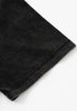 Hem detail of black T-shirt sleeve.
