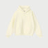 Cream colored oversized hoodie with kangaroo pocket on light background