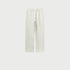 Pure white sweatpants with elastic waistband, drawstring and side pockets displayed on light gray background.