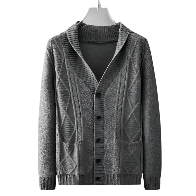 Dark gray knit cardigan displayed on hanger showing textured front panels, button closure, and ribbed collar details