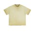 Pale cream oversized t-shirt with subtle gradient effect displayed flat against white background