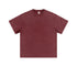 Product shot of burgundy acid-washed oversized t-shirt with crew neck and short sleeves on plain background