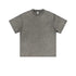 Product shot of gray acid-washed oversized t-shirt with crew neck and short sleeves on plain background