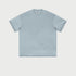 Pale blue oversized t-shirt displayed flat against light gray background with crew neck and short sleeves