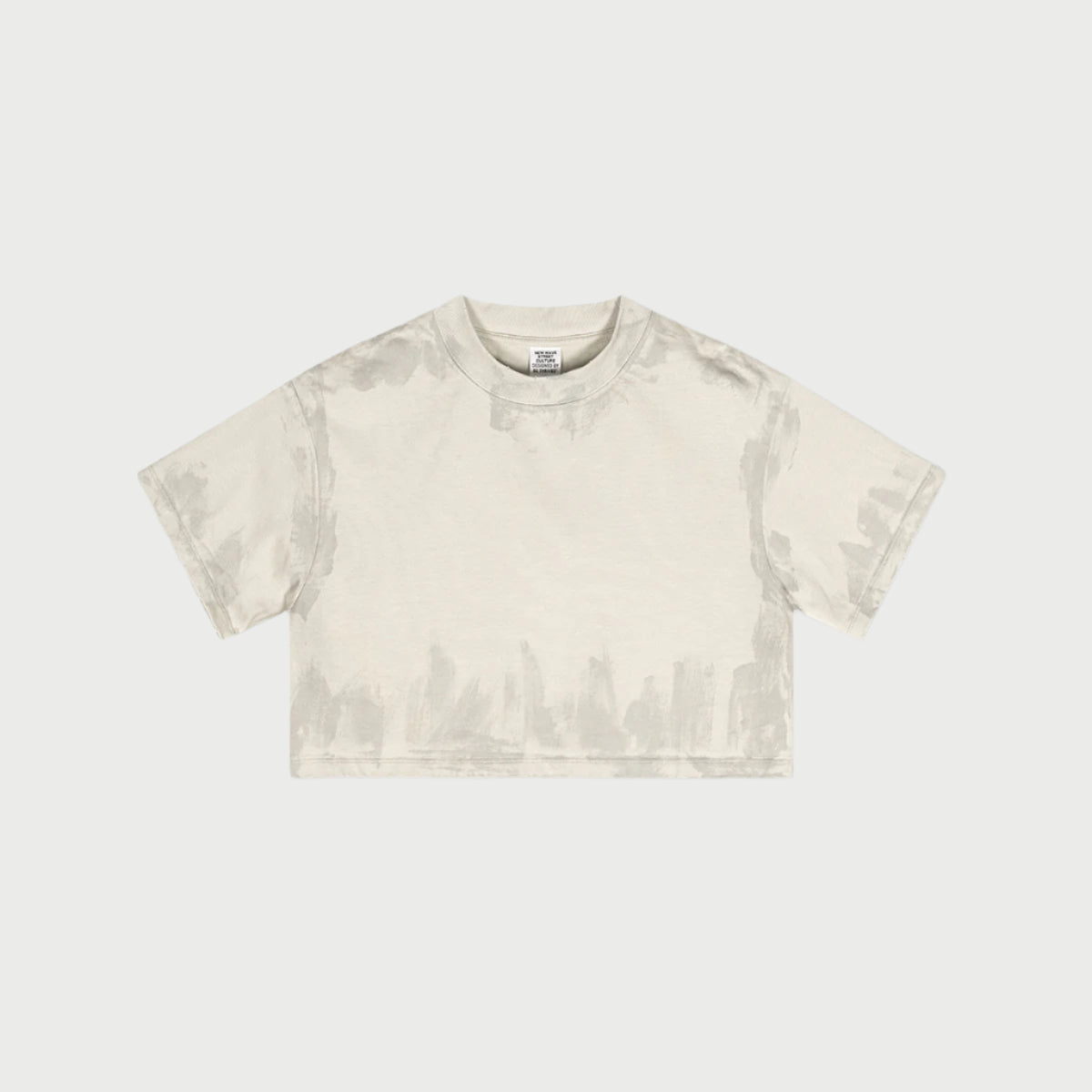 Cream colored cropped t-shirt with subtle texture pattern displayed flat against white background