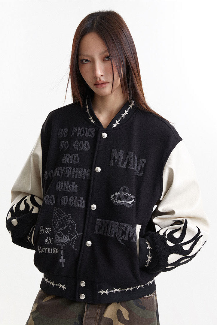 Three-quarter front view showing chest embroidery, ribbed collar, and welt pockets