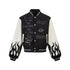 Black embroidered varsity jacket isolated on white with cream flame sleeves and snap front