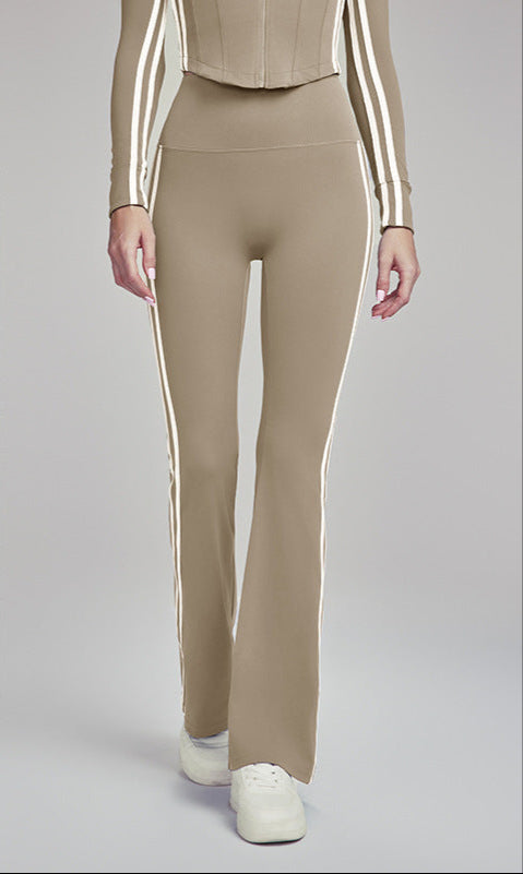 Khaki flare leggings with white stripes, styled with matching top, full front view.