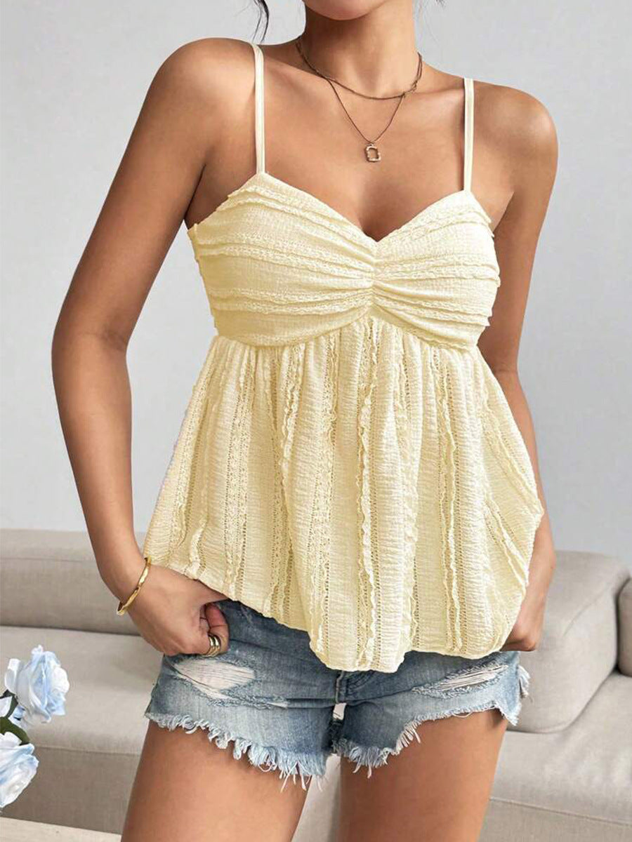 Yellow cami tank styled with denim shorts for summer look