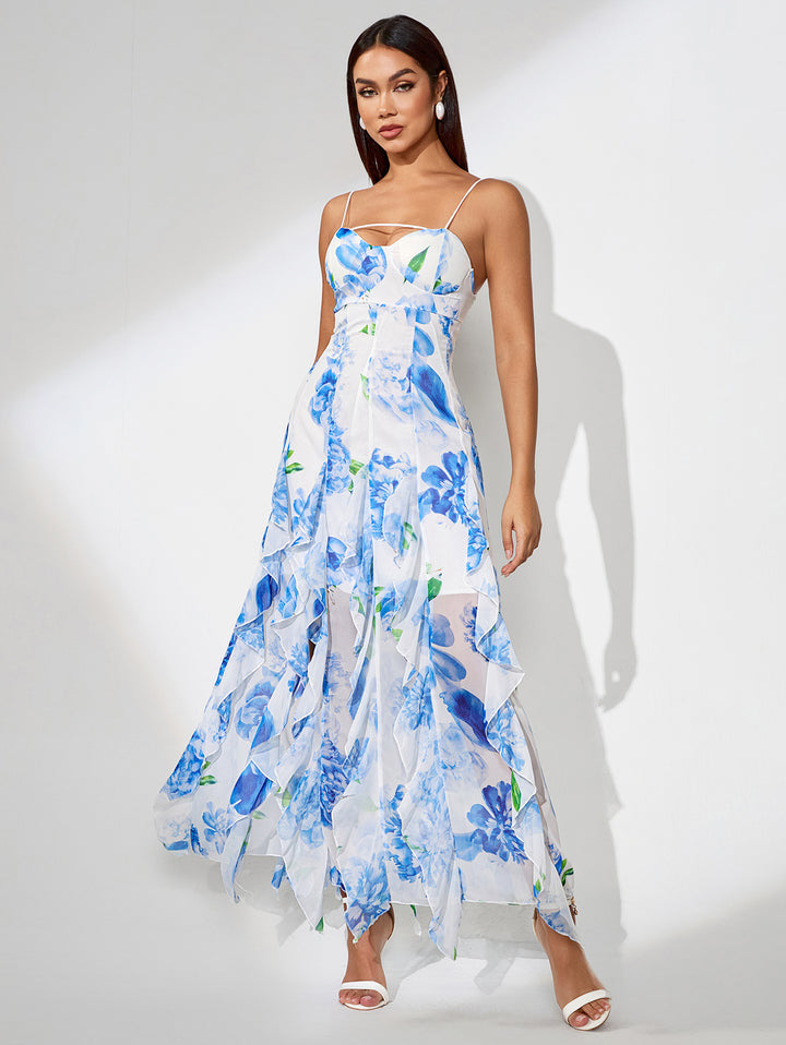 Woman wearing a blue floral slit dress on a white background