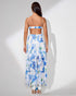 Back view of Woman wearing a floral dress with a white background
