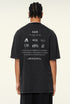 Back view of graphic tee with multiple logos and motivational text
