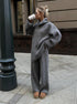 Woman wearing gray half zip sweater 2 piece set with wide leg pants outdoors